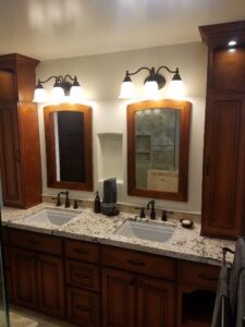 Bathroom 2 - Custom made vanity & towers, stained to match the mirrors.