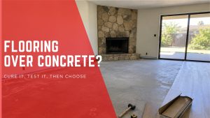 Concrete slab mid-remodel with vinyl planks, a mallet, and a moisture meter, showing flooring over a concrete slab